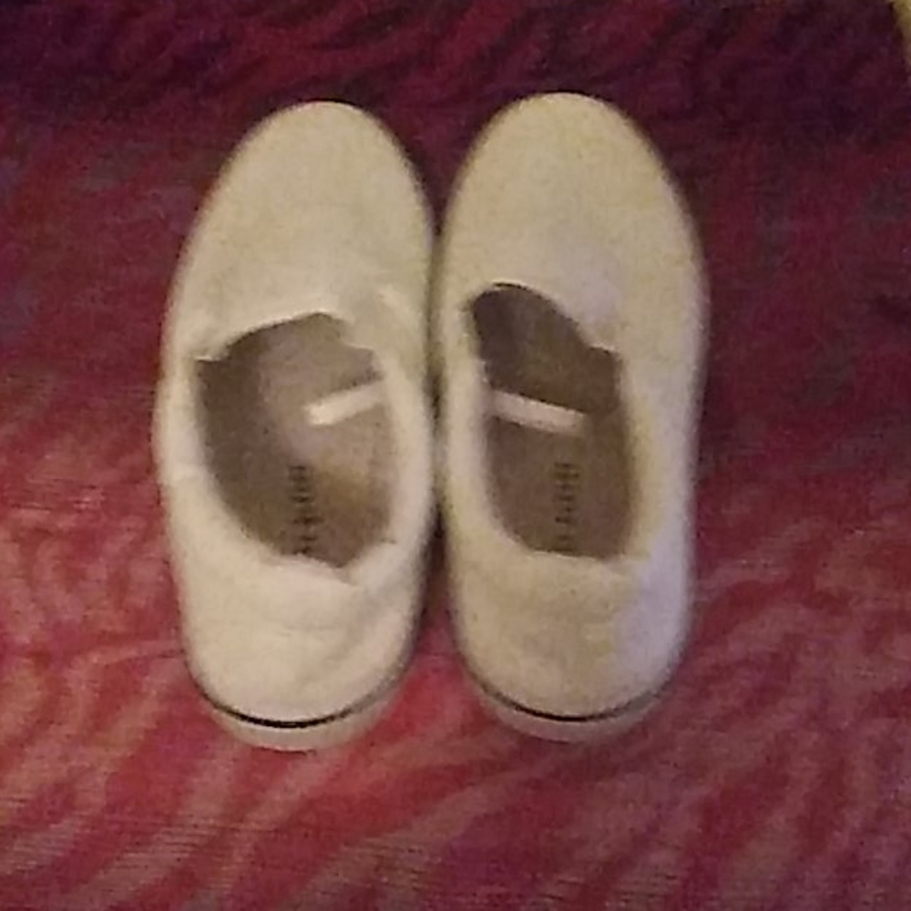 A pair of white sneakers